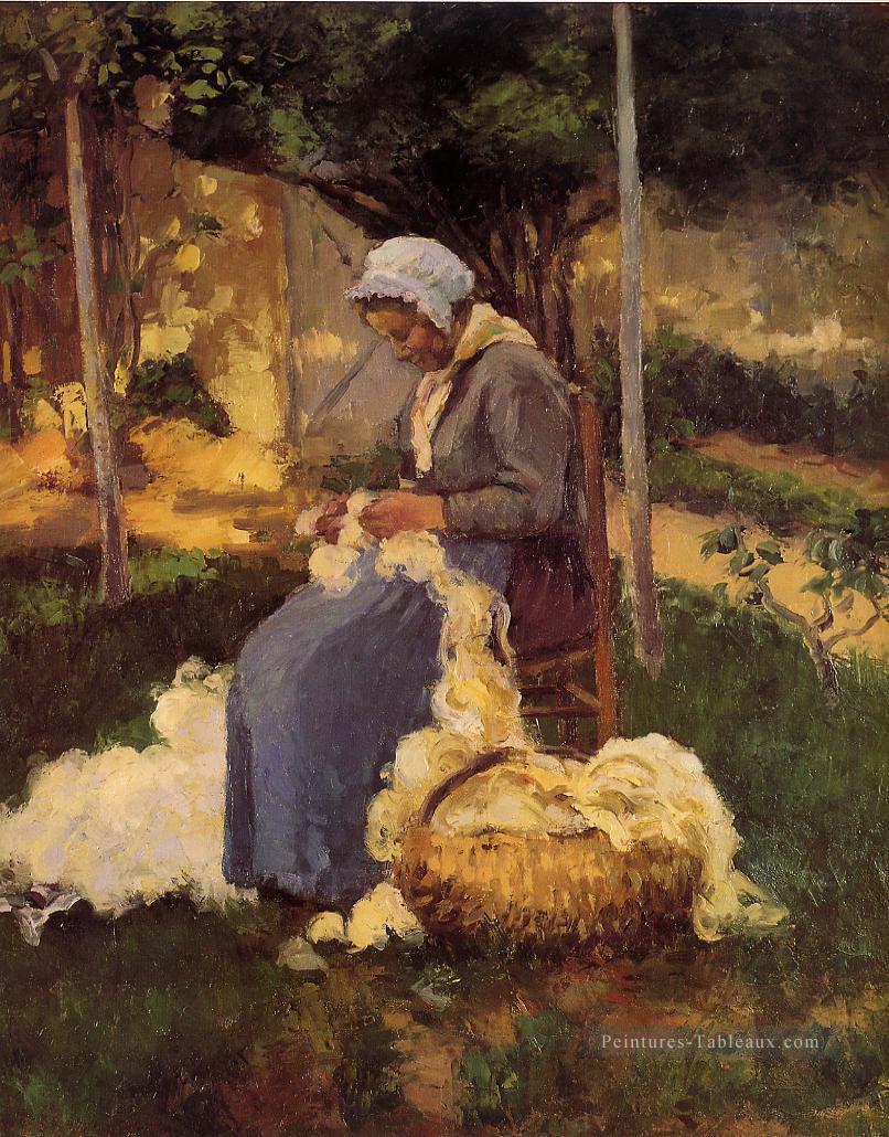 Femme cardan en laine cardée 1875 Camille Pissarro Peintures à l'huile